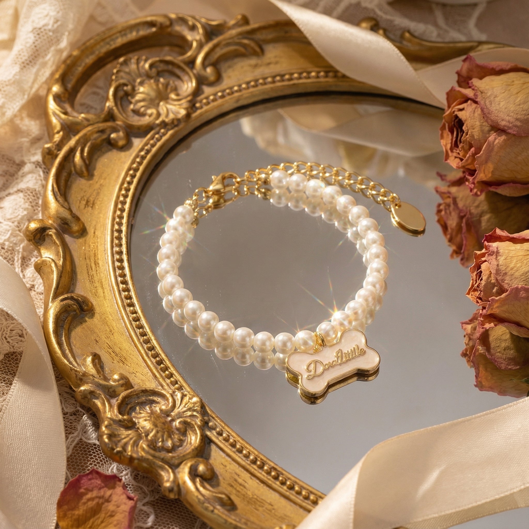 The Gilded Bone freshwater pearl bracelet featuring a glossy Beige enamel center framed in 18k gold by Sleviora