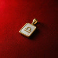 White mother-of-pearl, golden Libra astrological symbol