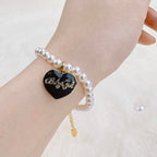 Freshwater Pearl Bracelet: Timeless Classic for Everyday Pearl Jewelry(Black Enamel Heart-Shaped Pendant)  Selviora