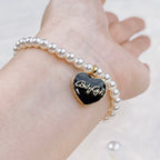 Freshwater Pearl Bracelet: Timeless Classic for Everyday Pearl Jewelry(Black Enamel Heart-Shaped Pendant)  Selviora