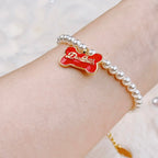 The Gilded Bone Rococo Pearl Bracelet(Red Enamel Bone)  Selviora