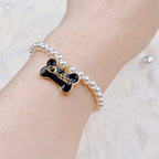 The Gilded Bone Rococo Pearl Bracelet(Black Enamel Bone)  Selviora