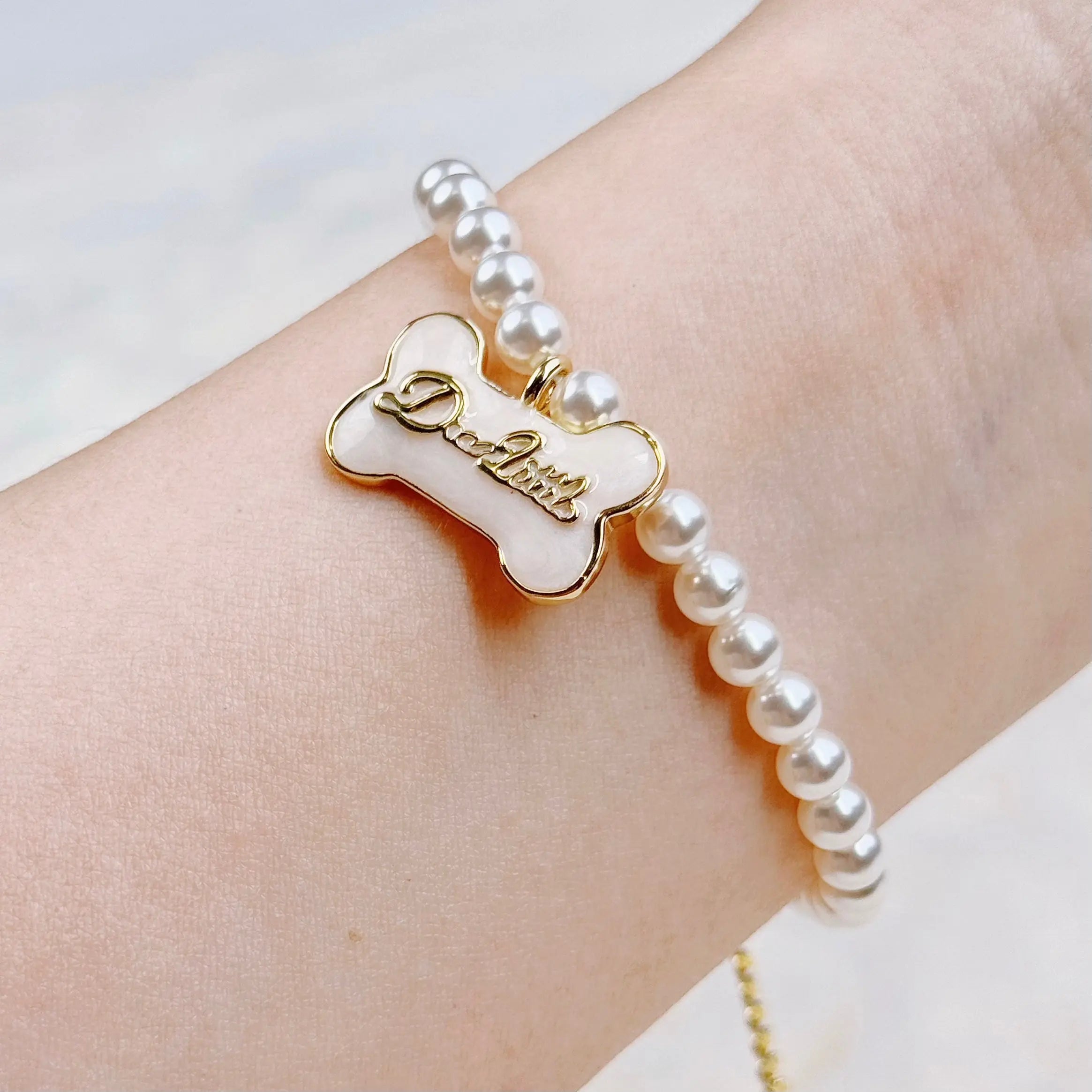 The Gilded Bone Rococo Pearl Bracelet(Beige Enamel Bone)  Selviora