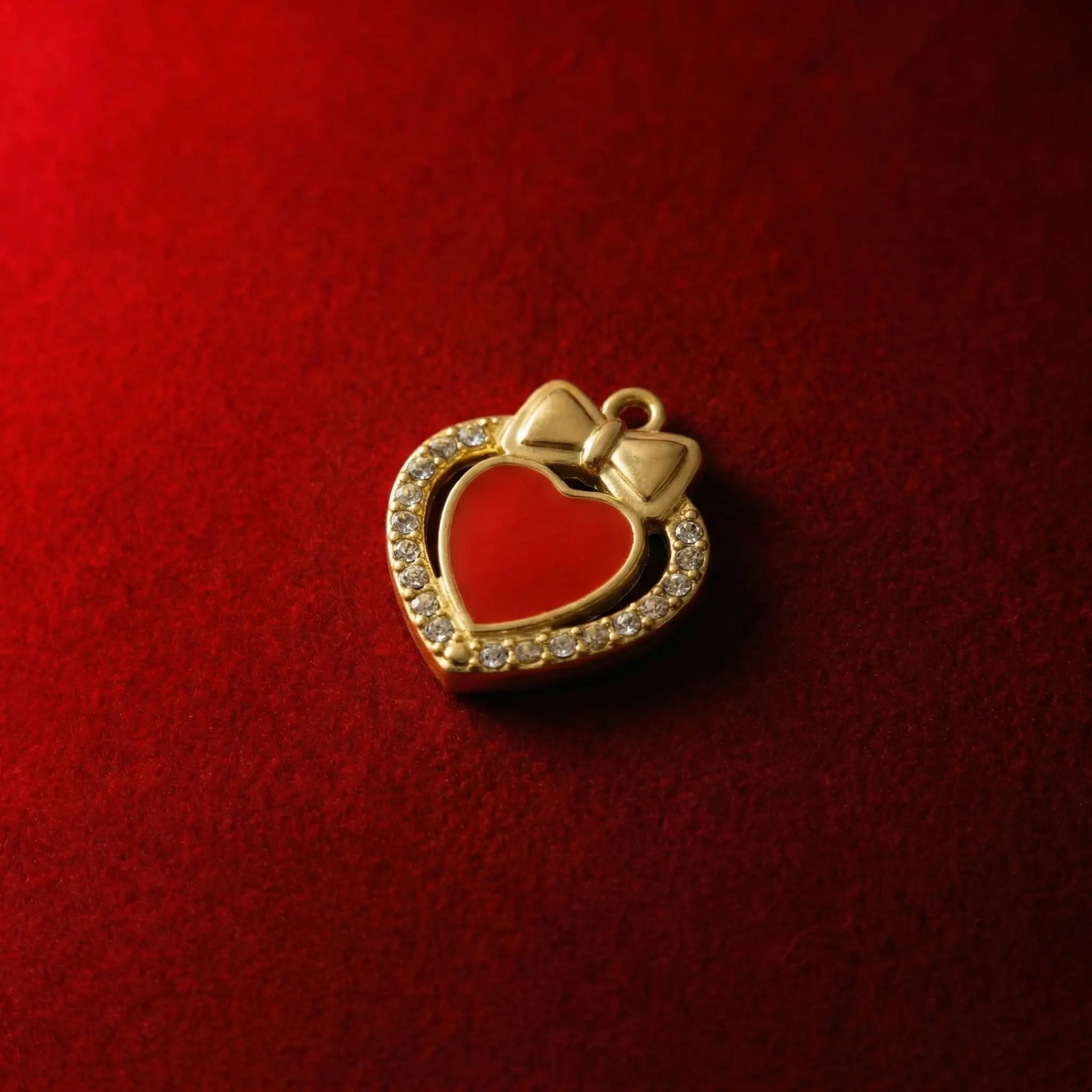 Coquette Girly Jewelry: Red enamel heart pendant with gold bow and crystal halo. Gold ribbon bow heart pendant set with sparkling zirconia. Valentine's Day